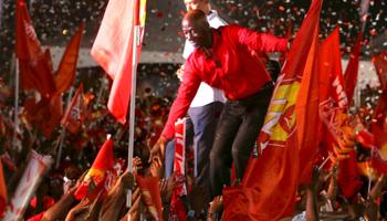Keith Rowley with PNM supporters in Tacarigua, Trinidad (Reuters/Karla Ramoo)