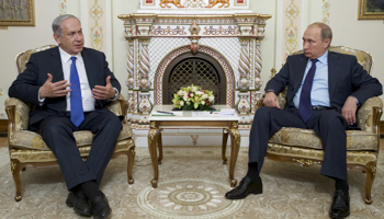 Israeli Prime Minister Benjamin Netanyahu speaks with Russian President Vladimir Putin near Moscow, Russia (Reuters/Ivan Sekretarev)