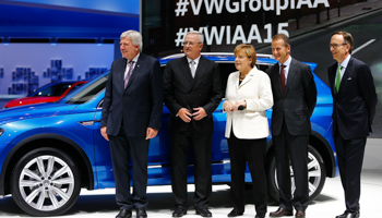 German Chancellor Angela Merkel with Premier Volker Bouffier, CEO of Volkswagen and chairman of Volkswagen in Frankfurt (Reuters/Kai Pfaffenbach)