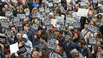 Demonstrators hold placards read that: "We know the murderer!" during a protest against Saturday's Ankara bombings, in Istanbul (Reuters/Murad Sezer)