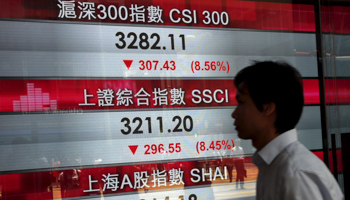 A panel displaying China stock indexes at the financial Central district in Hong Kong (Reuters/Bobby Yip)