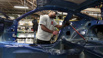 A Ford Motor assembly worker (Reuters/Rebecca Cook)