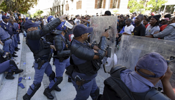 Police clash with students outside South Africa's Parliament in Cape Town (Reuters/Mark Wessels)