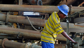 A worker at the Congolese state mining company Gecamines' copper concentrator at its Kambove operation in Katanga (Reuters/Jonny Hogg)