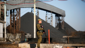 A pro-Russian separatist outside coal mine "Kommunar", east of Donetsk (Reuters/Maxim Zmeyev)