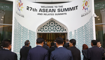 Delegates enter the venue for the 27th Association of Southeast Asian Nations summit in Kuala Lumpur (Reuters/Olivia Harris)