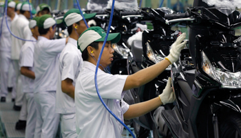 Workers assemble motorcycles at the PT Astra Honda Motor motorcycle factory in Jakarta. (Reuters/Enny Nuraheni)