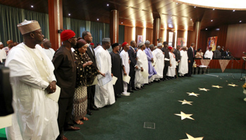 Newly appointed ministers attend their swearing in ceremony in Abuja (Reuters/Afolabi Sotunde)