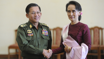 Min Aung Hlaing and Aung San Suu Kyi shake hands after their meeting in Naypyitaw (Reuters/Phyo Hein Kyaw/Pool)