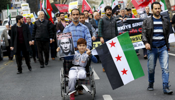 A Syrian boy with an amputated leg takes part in an anti-Russian protest in Istanbul, Turkey (Reuters/Murad Sezer)