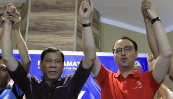 Rodrigo Duterte, on the left, with Senator Alan Peter Cayetano during their proclamation ceremony (Reuters/Romeo Ranoco)