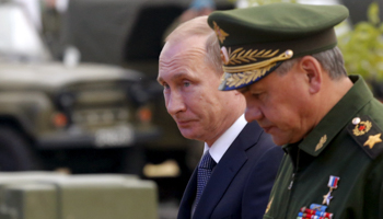 President Vladimir Putin and Defence Minister Sergei Shoigu (Reuters/Maxim Shemetov)