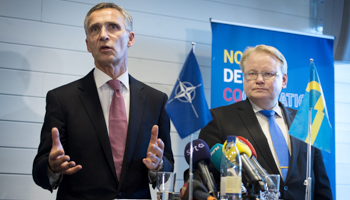 NATO Secretary General Jens Stoltenberg, left, and Sweden's Defence Minister Peter Hultqvist (Reuters/Jessica Gow/TT News Agency)