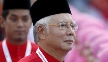 Prime Minister Najib Razak at the United Malays National Organisation annual assembly at the Putra World Trade Centre in Kuala Lumpur (Reuters/Olivia Harris)