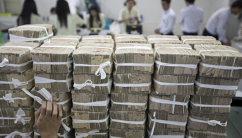 Stacks of Myanmar Kyat in Yangon (Reuters/Minzayar)