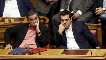 Alexis Tsipras and Euclid Tsakalotos before a vote on an omnibus bill at parliament, Athens (Reuters/Michalis Karagiannis)