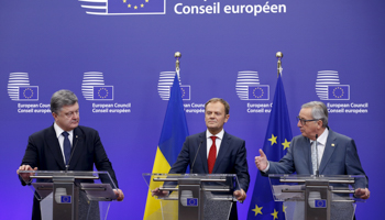 Ukraine's President Poroshenko, European Council President Tusk and European Commission President Juncker at the EU Council in Brussels, Belgium (Reuters/Francois Lenoir)