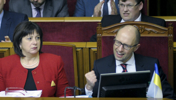 Ukraine's Prime Minister Arseny Yatseniuk, right, with Finance Minister Natalia Yaresko parliament session in Kiev (Reuters/Andrew Kravchenko/Pool)
