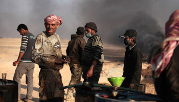 A makeshift oil refinery near Raqqa, Syria (Reuters/Hamid Khatib)