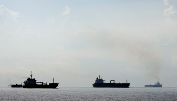 Tankers travel through the Singapore Strait (Reuters/Tim Wimborne)