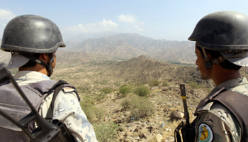 Saudi soldiers stand guard in Jizan province on the Yemeni border (Reuters/Faisal Al Nasser)