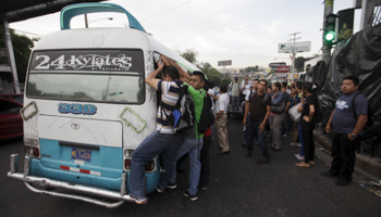Bus companies are often the target of extortion schemes in Latin America
 (Reuters/Jose Cabezas)
