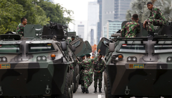 Military armoured personnel carriers near the site of an attack in central Jakarta (Reuters/Darren Whiteside)