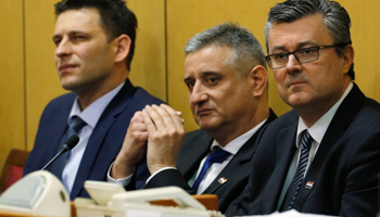 Right to left, Croatia's new Prime Minister Tihomir Oreskovic, First Deputy Prime Minister Tomislav Karamarko and Deputy Prime Minister Bozo Petrov (Reuters/Antonio Bronic)