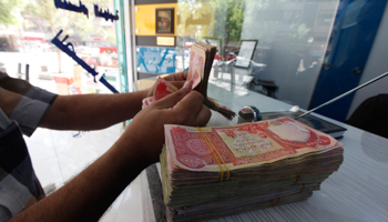 A currency exchange in Baghdad (Reuters/Saad Shalash)