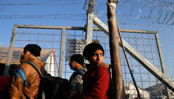 Migrants at the border fence, near the village of Idomeni, Greece (Reuters/Marko Djurica)