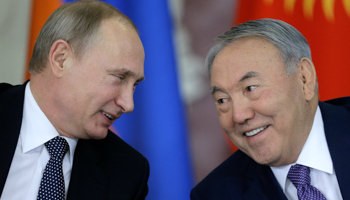 Russia's President Vladimir Putin, left, talks to his Kazakh counterpart Nursultan Nazarbayev (Reuters/Maxim Shipenkov)