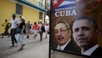 US President Barack Obama and Cuban President Raul Castro in a banner that reads "Welcome to Cuba", Havana (Reuters/Alexandre Meneghini)