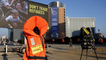 Lifejackets are pictured in front of the European Commission headquarters in protest by Amnesty International demanding  human rights protection of refugees within the EU-Turkey migration deal in Brussels (Reuters/Francois Lenoir)