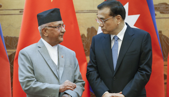 Chinese Premier Li Keqiang, right, talks to Nepal Prime Minister K P Sharma Oli (Reuters/Lintao Zhang/Pool)