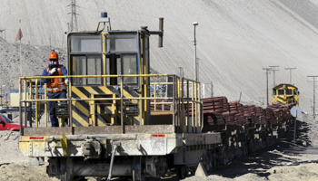 A train loaded with copper cathodes travels inside the Chuquicamata copper mine, Chile (Reuters/Ivan Alvarado)