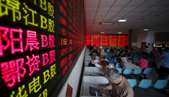 Investors at a brokerage house in Shanghai (Reuters/Aly Song)