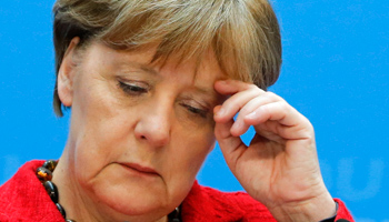 Angela Merkel attends a news conference at the CDU party headquarters in Berlin (Reuters/Fabrizio Bensch)