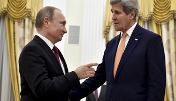 Russian President Vladimir Putin with US Secretary of State John Kerry (Reuters/Alexander Nemenov/Pool)