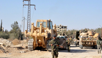 Regime forces in the town of al-Qaryatain, Syria (Reuters/SANA/Reuters)