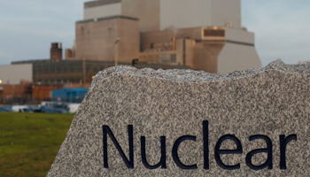 A sign is seen outside EDF Energy's Hinkley Point B nuclear power station in Bridgwater (Reuters/Suzanne Plunkett)