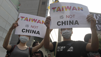 Activists protest in Taipei (Reuters/Pichi Chuang)