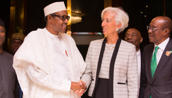 Nigerian President Muhammadu Buhari, IMF Managing Director Christine Lagarde and Governor of Central Bank of the Nigeria Godwin Emefiele attend a meeting in Abuja (Reuters/Stephen Jaffe)