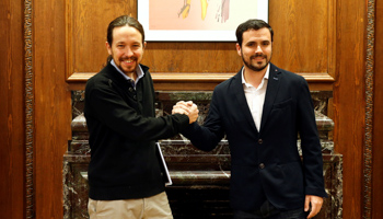 Podemos leader Pablo Iglesias, left, and Izquierda Unida leader Alberto Garzon (Reuters/Andrea Comas/File Photo)