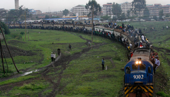 Commuters aboard a train in Kenya (Reuters/Thomas Mukoya)