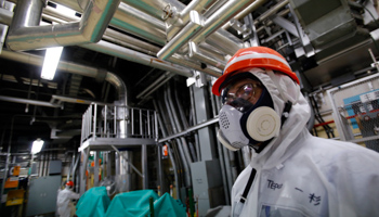 TEPCO employee at the Fukushima Daiichi nuclear power plant (Reuters/Toru Hanai)