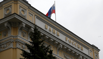 A Russian national flag flies over the Central Bank headquarters in Moscow (Reuters/Sergei Karpukhin)