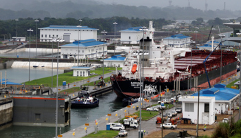 A Malta flagged cargo ship navigates through the Agua Clara locks during a test of the new Panama Canal expansion project in Agua Clara (Reuters/Carlos Jasso)