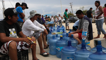 People wait to buy water after Hurricane Odile hit Baja California (Reuters/Henry Romero)