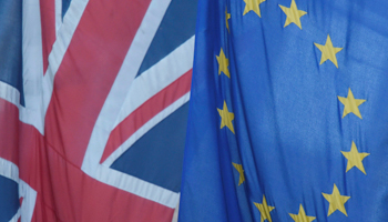 A Union flag flies next to the flag of the European Union in London. (Reuters/Toby Melville)