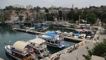 Boats await customers in the old harbour of Antalya, Turkey (Reuters/Kaan Soyturk)